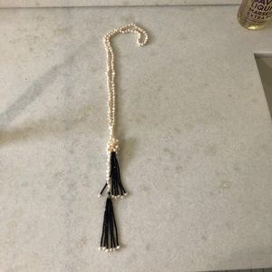 Beaded necklace with black tassels